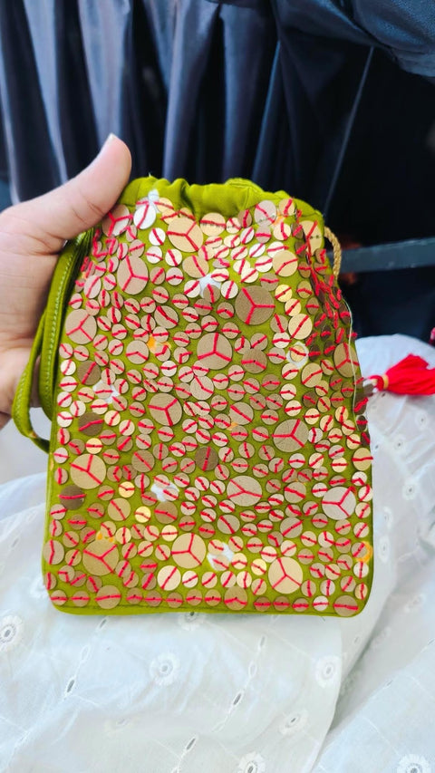 Olive green sequence potli sling bag with red thread work, Doribharat