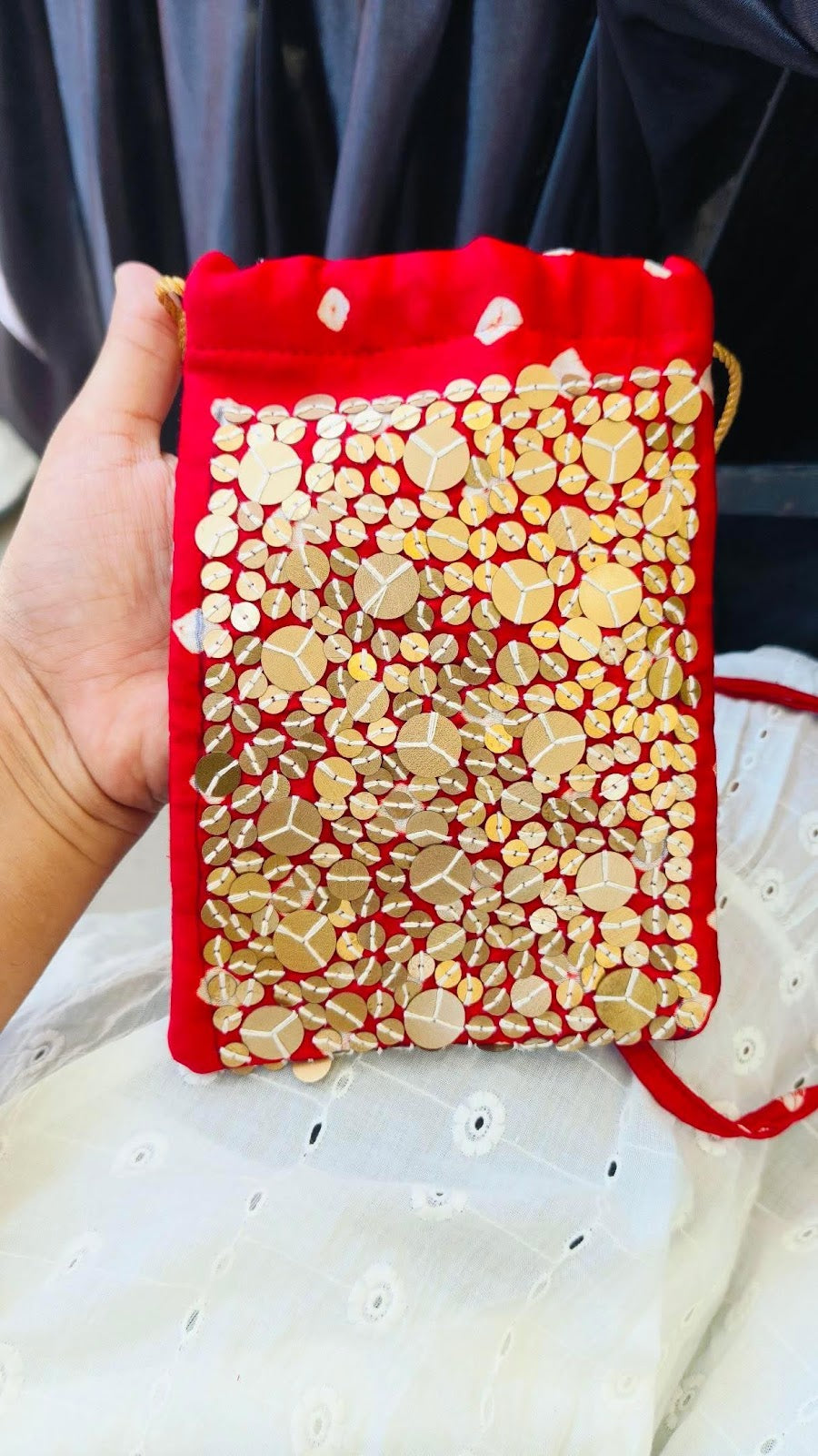 Bottle green bandhani potli sling bag with gold sequence work, Doribharat 1