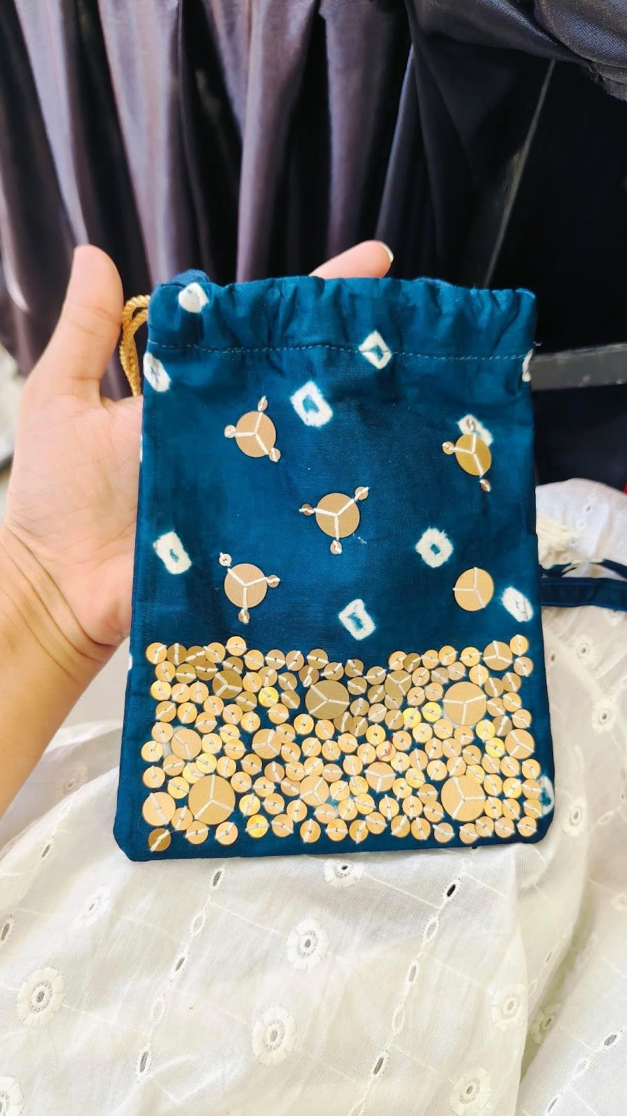 Teal bandhani potli sling bag with gold sequence work, Doribharat 1