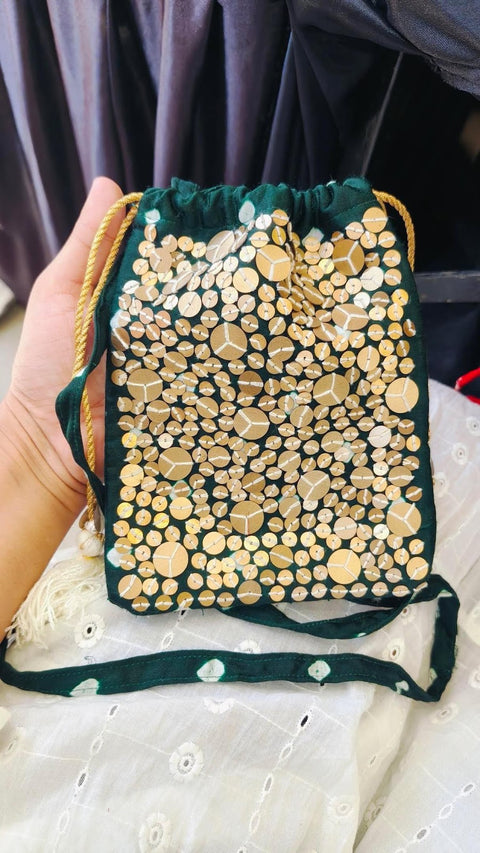 Red bandhani potli sling bag with gold sequence work, Doribharat