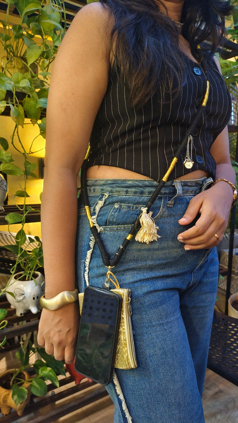 Woman wearing the Black Phone Sling