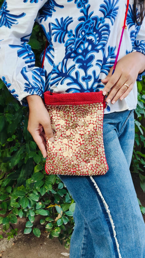 Woman wearing the Red Sequence Potli