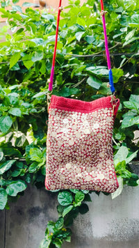 Red Sequence Potli with thread-wrapped strap 2